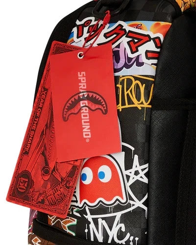 SPRAYGROUND PACMAN STICKERS DLXSV BACKPACK