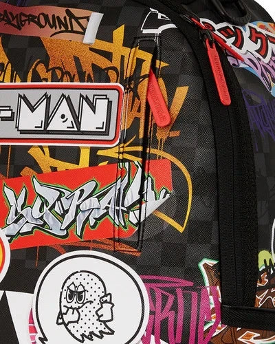 SPRAYGROUND PACMAN STICKERS DLXSV BACKPACK